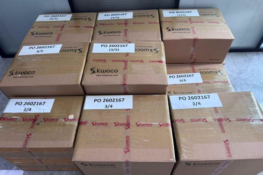 KWOCO warehouse staff preparing industrial automation products for shipment
